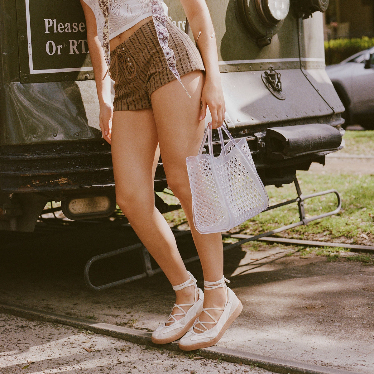 Nyomie Ivory Multi Leather Sneakers | Dolce Vita