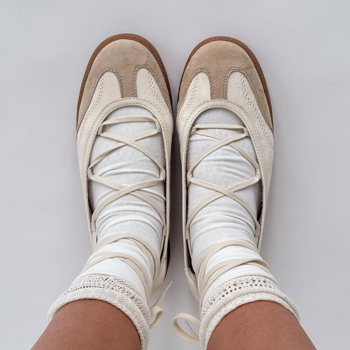 Nyomie Ivory Multi Leather Sneakers | Dolce Vita
