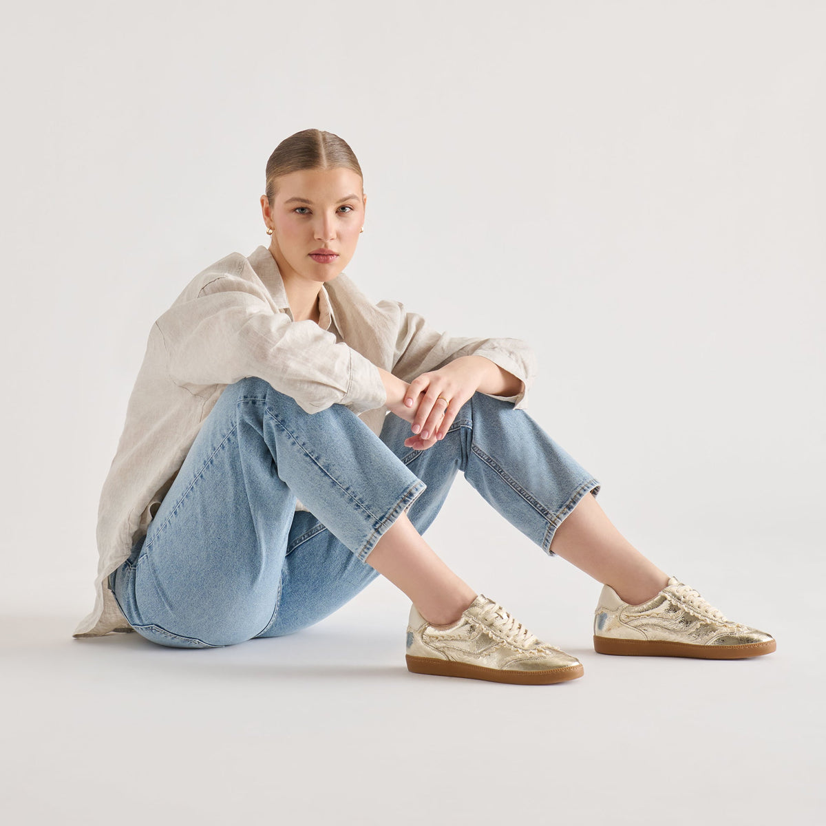 Notice Lace Platinum Distressed Leather Sneakers | Dolce Vita