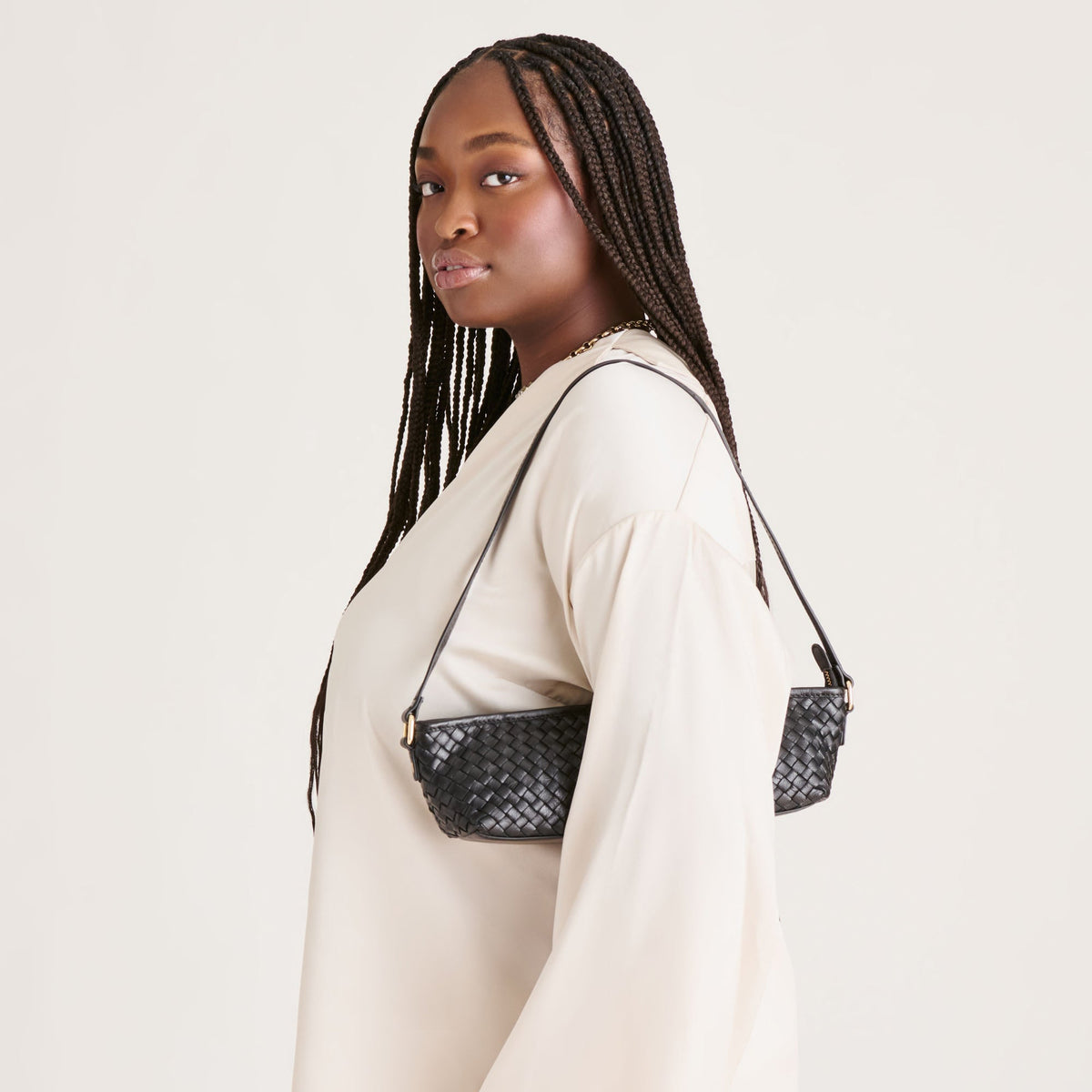 Savaii Black Woven Leather Shoulder Bag | Dolce Vita