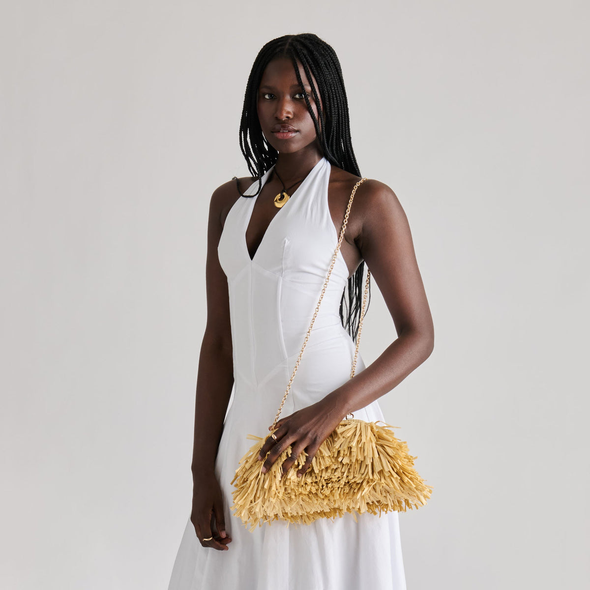 Serina Natural Raffia Clutch | Dolce Vita