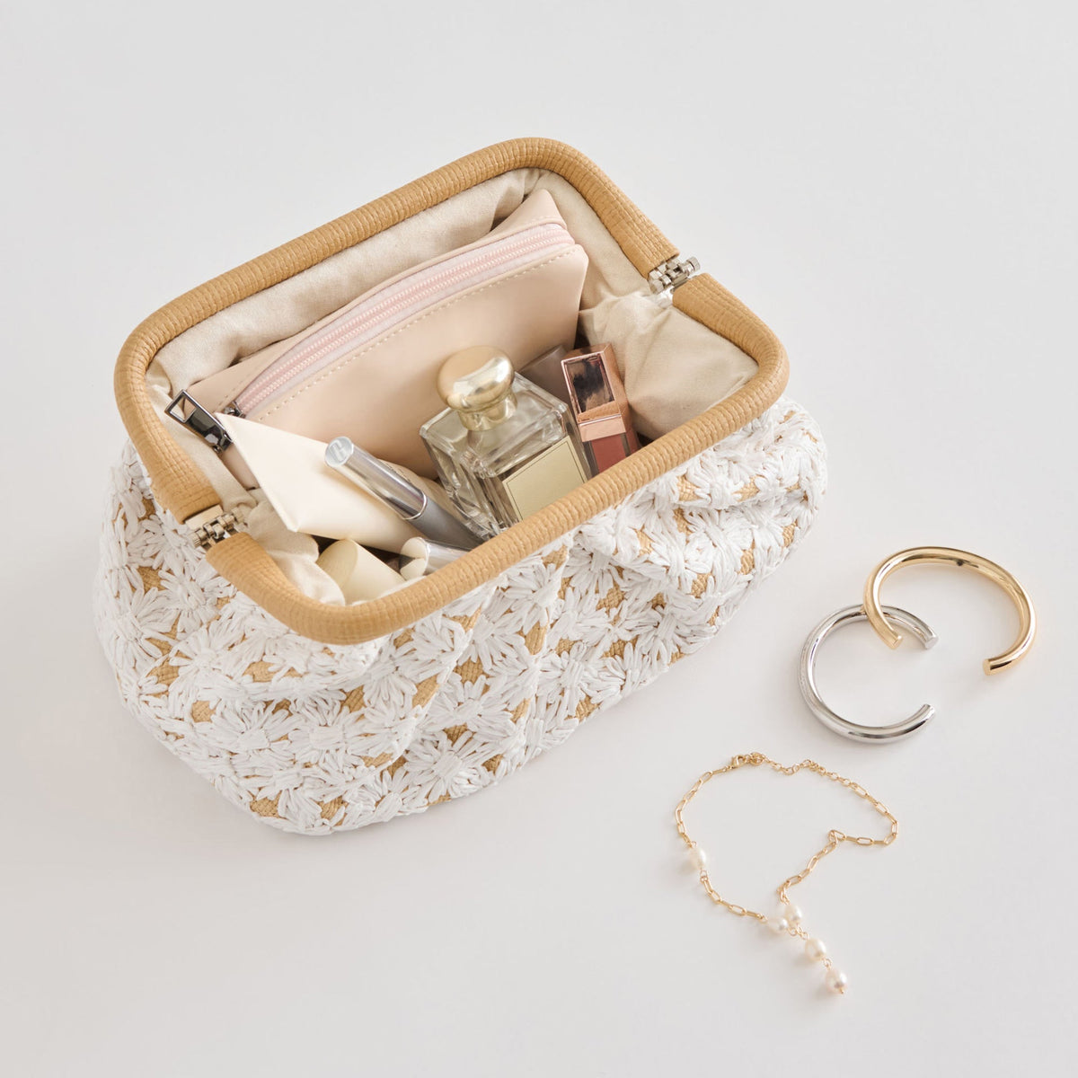 FIORE CLUTCH EMBROIDERED NATURAL RAFFIA
 – Dolce Vita | Dolce Vita
